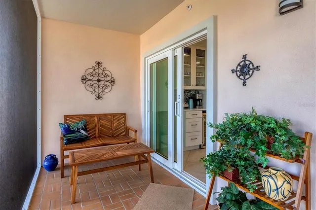 a kitchen with a refrigerator and cabinets