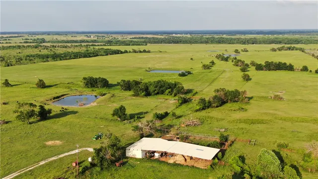a view of an ocean and a houses