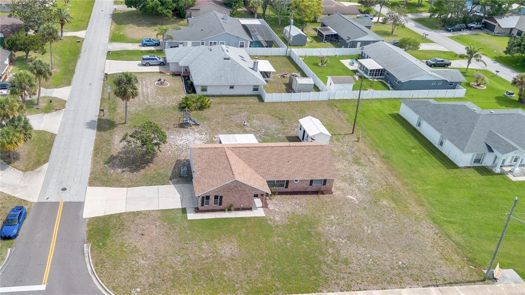 1842 Umbrella Tree Drive Edgewater, FL 32141 - Photo 26 of 32 an aerial view of a house with swimming pool