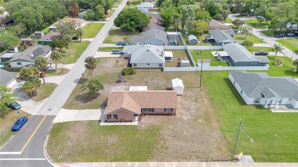 1842 Umbrella Tree Drive Edgewater, FL 32141 - Photo 27 of 32 an aerial view of a house with swimming pool