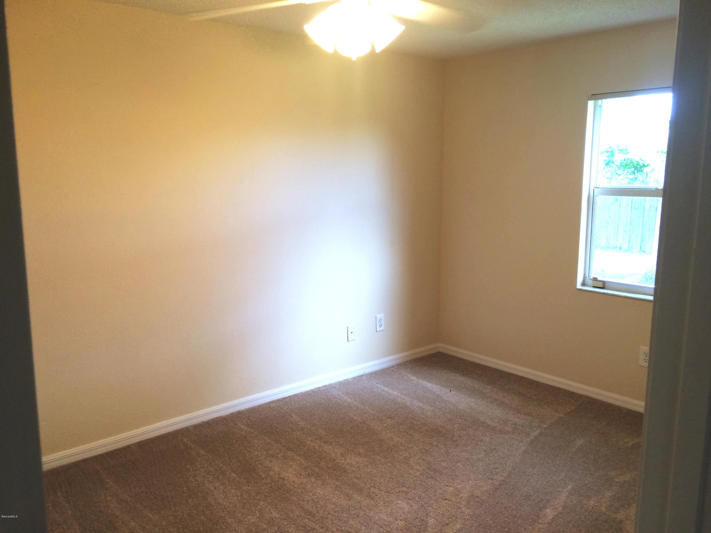 567 Croton Road Melbourne, FL 32935 - Photo 8 of 11 Second bedroom