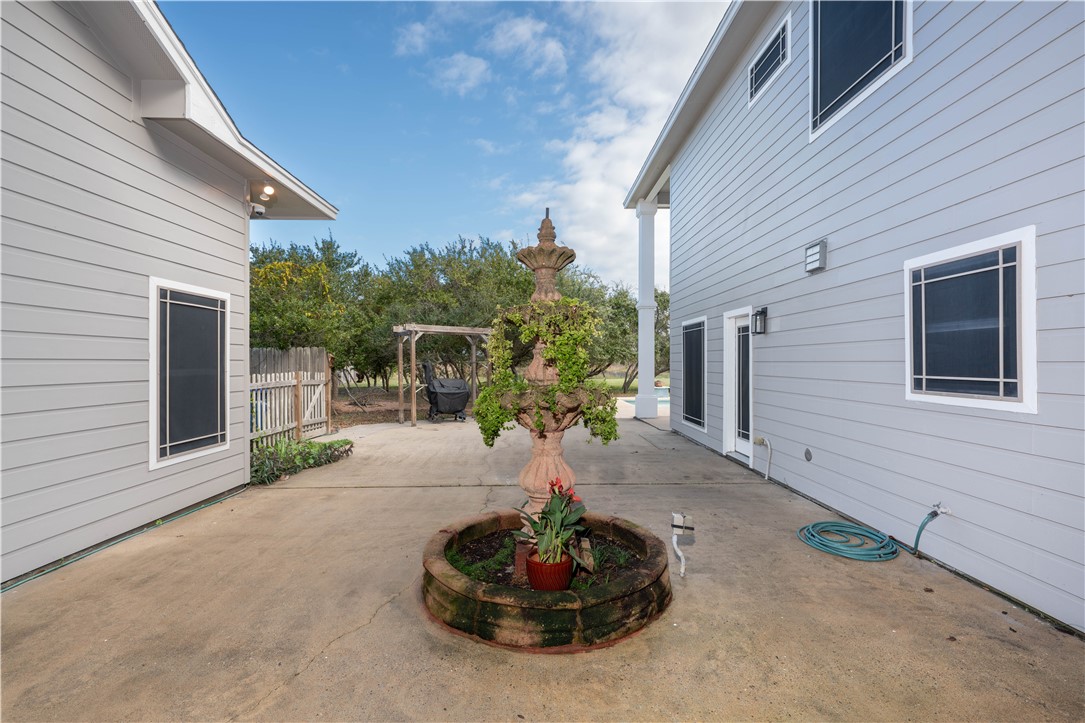 1034 Graham Road Corpus Christi, TX 78418 - Photo 34 of 40 Courtyard seen from access from front door