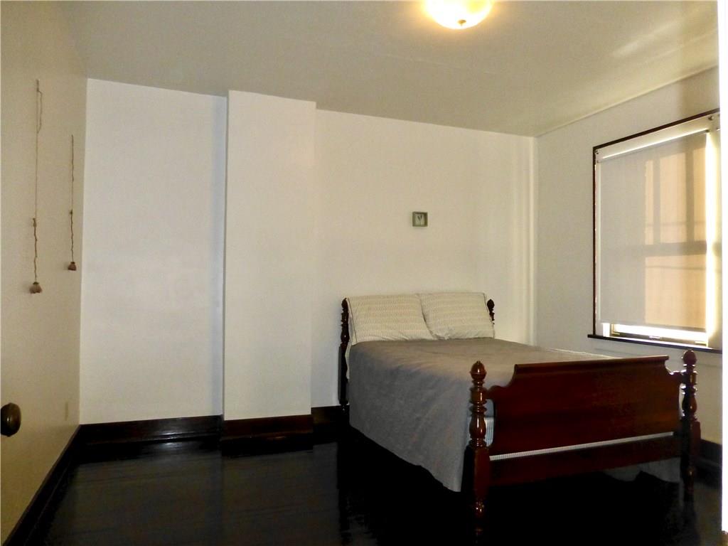 526 Ridge Avenue East Pittsburgh, PA 15112 - Photo 13 of 25 13x12 Master Bedroom with hardwood floors and lots of afternoon sun.