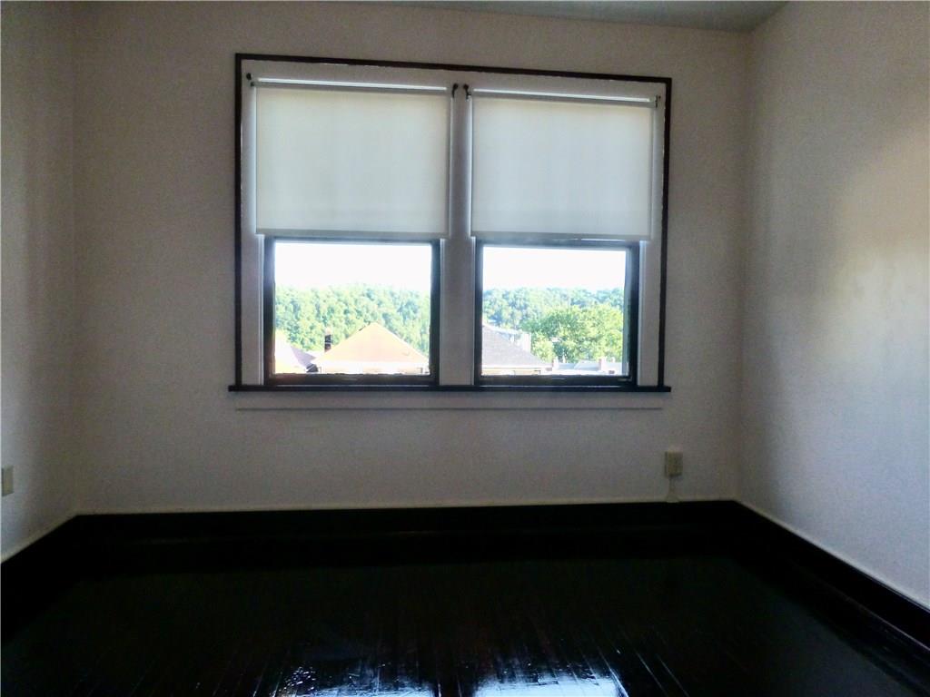 526 Ridge Avenue East Pittsburgh, PA 15112 - Photo 18 of 25 13x11 3rd Bedroom has hardwood floors and windows overlooking the back yard.