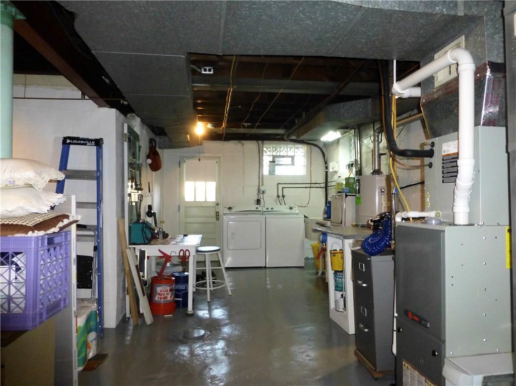 526 Ridge Avenue East Pittsburgh, PA 15112 - Photo 20 of 25 Large basement and laundry area has a new coat of paint on the floor.