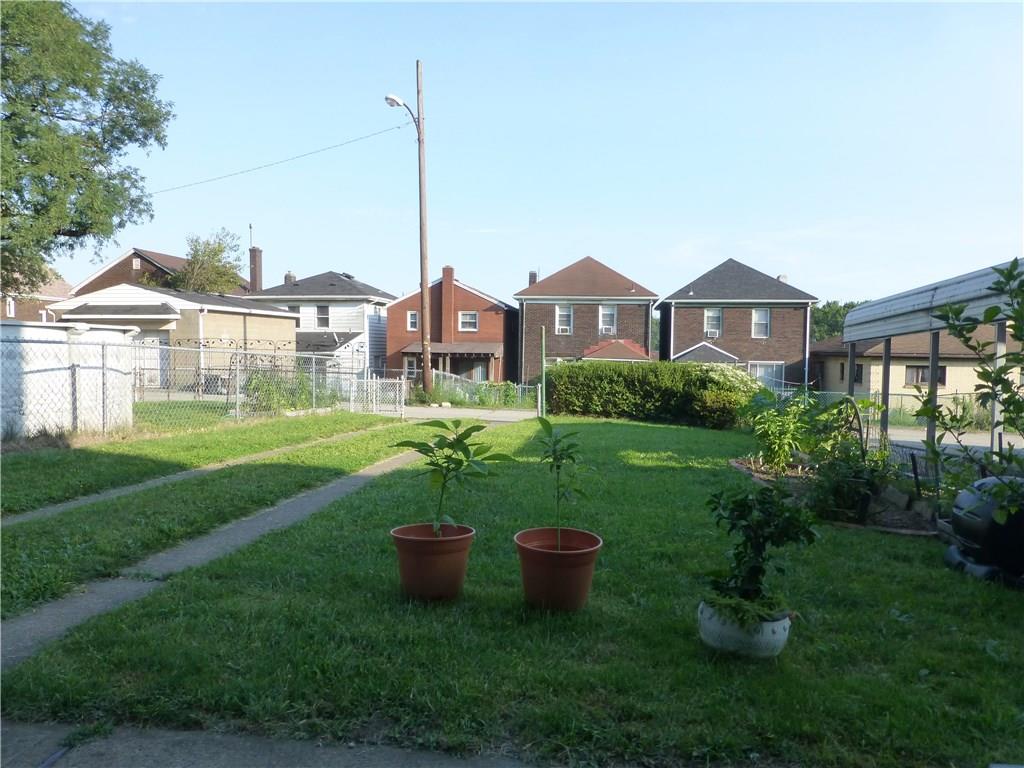 526 Ridge Avenue East Pittsburgh, PA 15112 - Photo 22 of 25 Large back yard with enough space for a small garden.