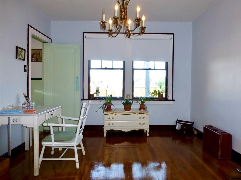 526 Ridge Avenue East Pittsburgh, PA 15112 - Photo 7 of 25 13x11 Dining room has hardwood floors and looks out to the back yard.