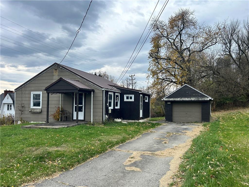 1347 High Road Clairton, PA 15025 - Photo 2 of 21 a front view of house with yard and green space