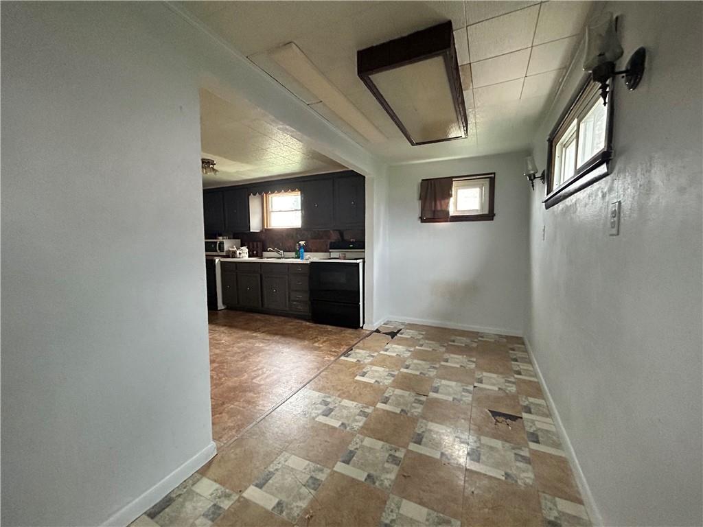 1347 High Road Clairton, PA 15025 - Photo 8 of 21 a view of a refrigerator in kitchen and a window