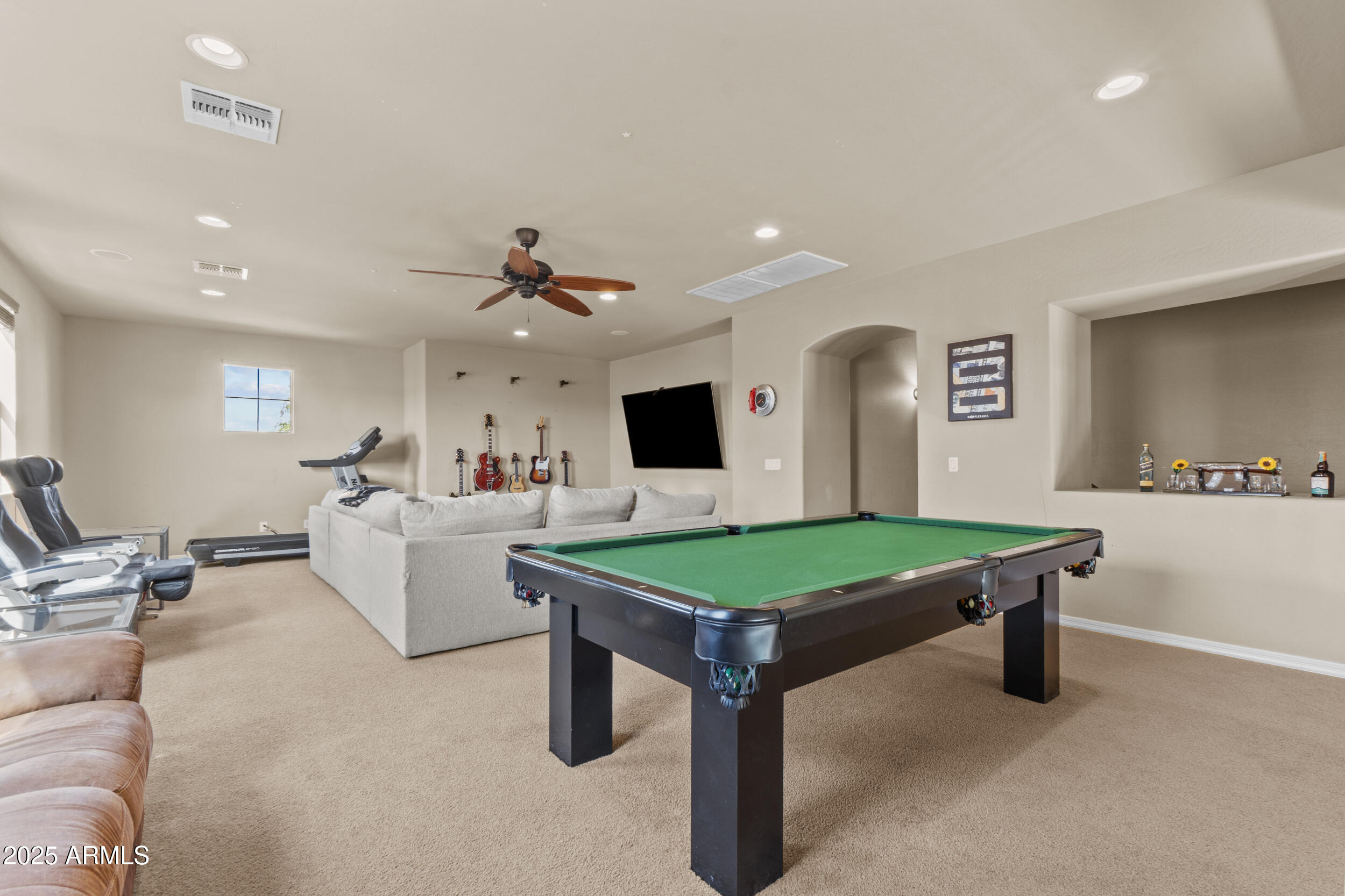 2879 East Janelle Way Gilbert, AZ 85298 - Photo 11 of 33 a living room with furniture pool table and flat screen tv