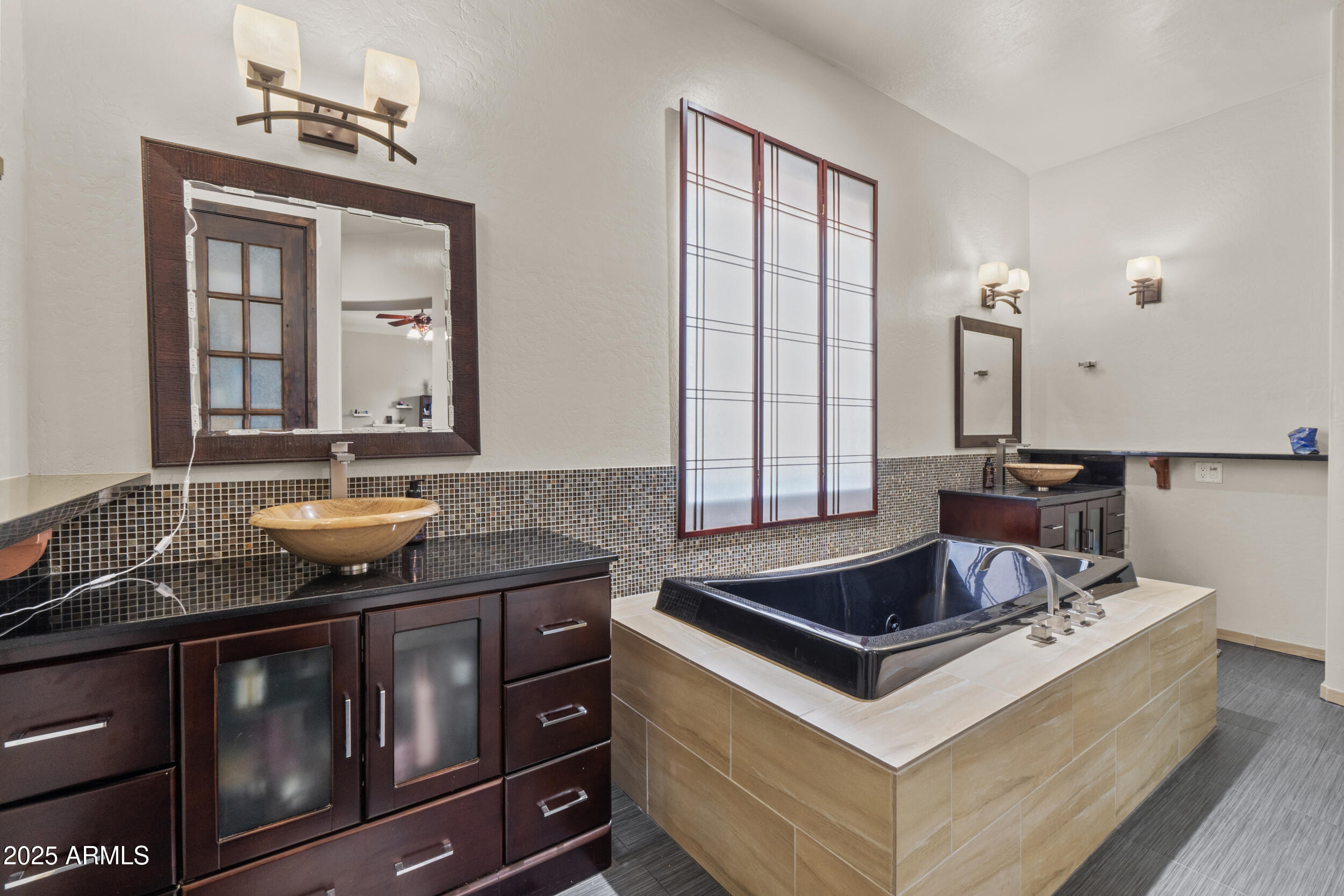 2879 East Janelle Way Gilbert, AZ 85298 - Photo 15 of 33 a kitchen with a stove and a sink