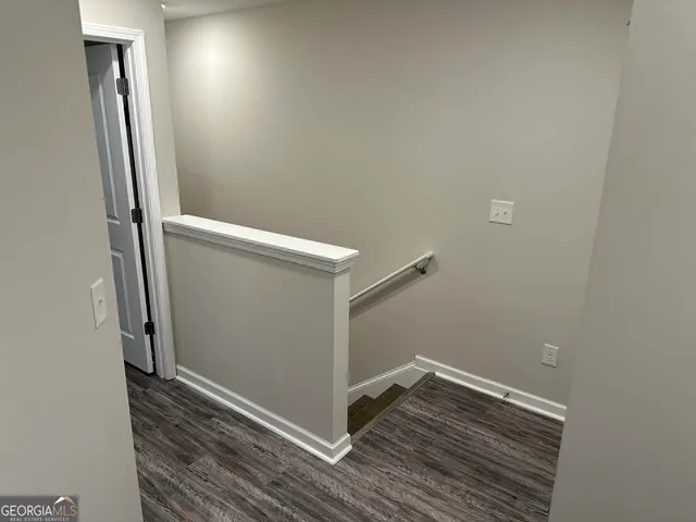 a view of small space with wooden floor