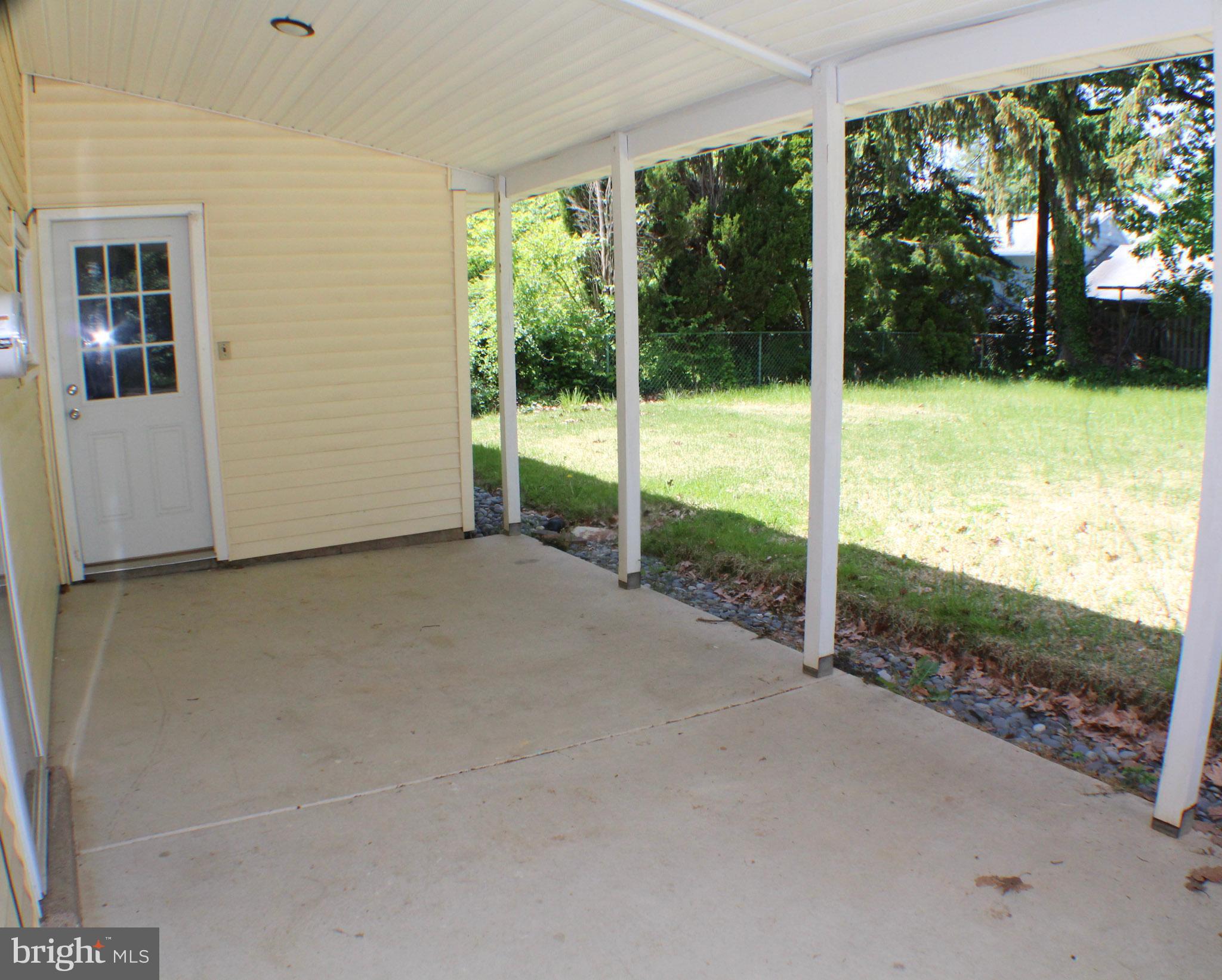 502 Berwyn Road Morrisville, PA 19067 - Photo 32 of 33 patio with entrance to garage