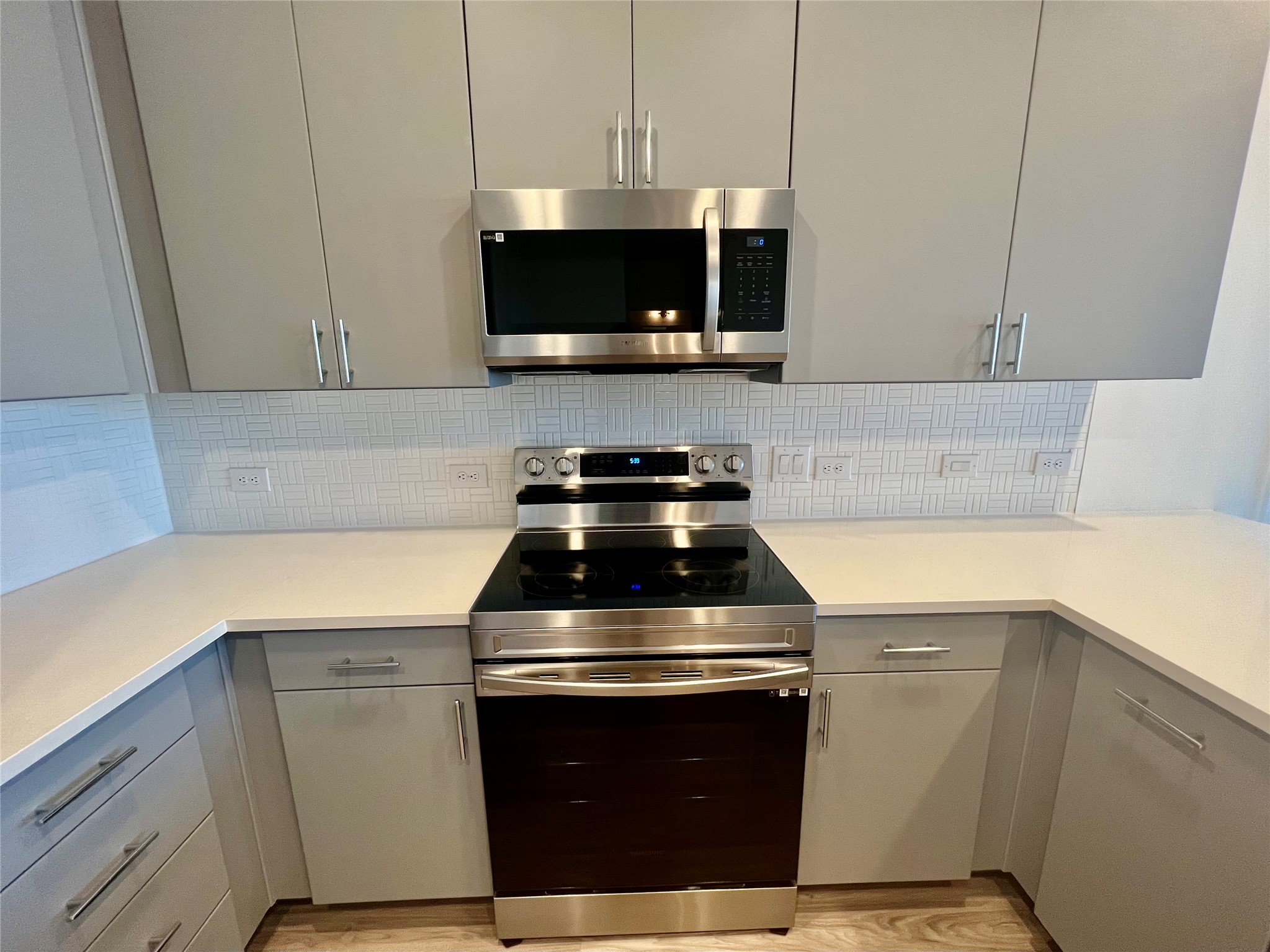 4801 Springdale Road, Unit 2210 Austin, TX 78723 - Photo 6 of 17 The kitchen features stainless steel appliances, a breakfast bar and plenty of storage