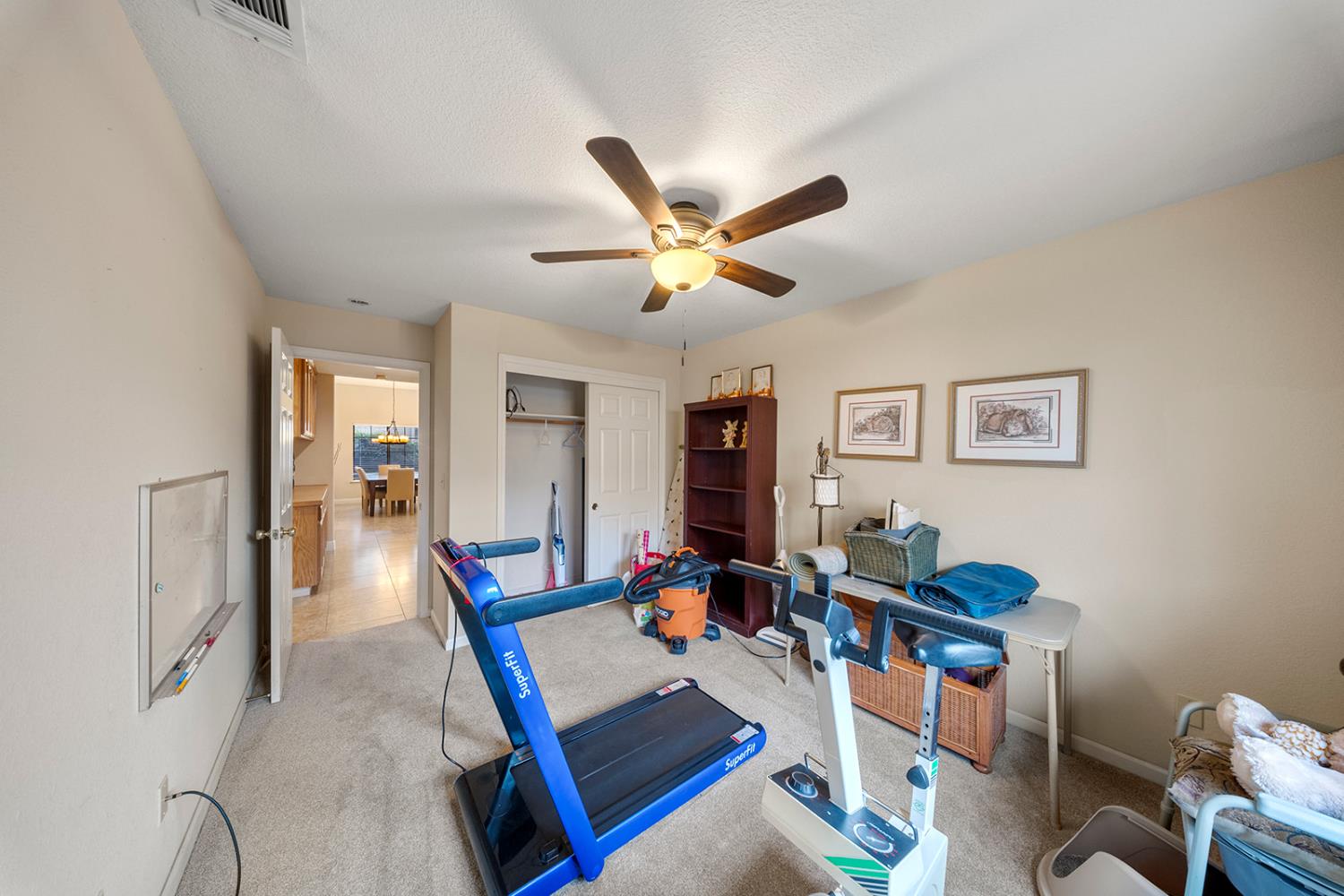 1837 Brookside Drive Manteca, CA 95336 - Photo 20 of 36 a living room with furniture and kitchen view