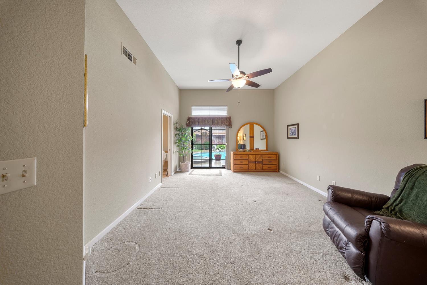1837 Brookside Drive Manteca, CA 95336 - Photo 25 of 36 a view of a livingroom with furniture and staircase