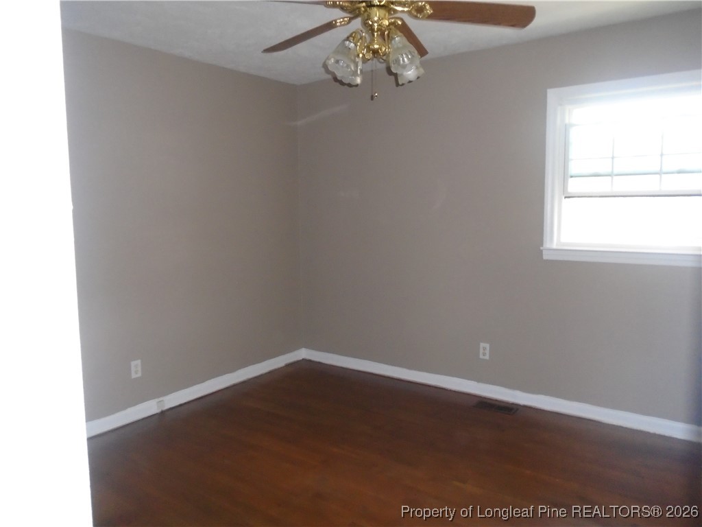 611 Drypoint Lane, Unit 1 Hope Mills, NC 28348 - Photo 15 of 15 an empty room with a window