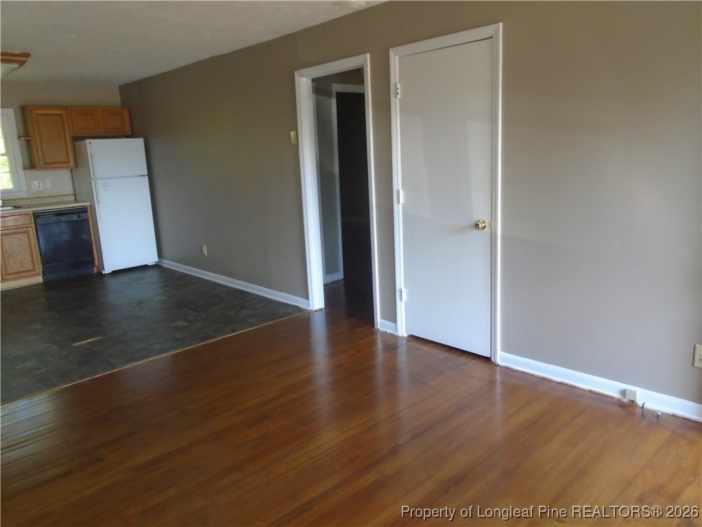 611 Drypoint Lane, Unit 1 Hope Mills, NC 28348 - Photo 7 of 15 an empty room with wooden floor and closet