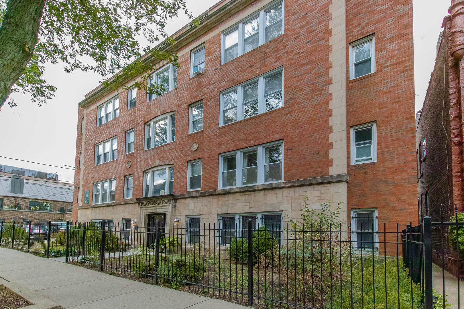 a view of a building with a street view