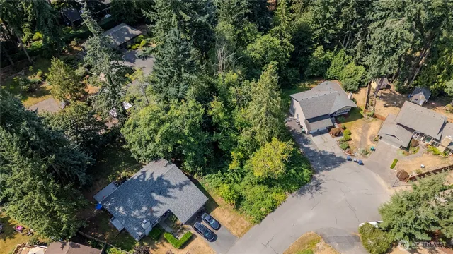 an aerial view of a house with outdoor space