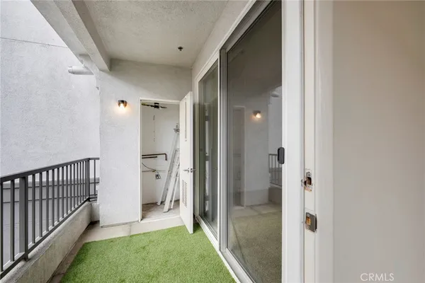 a view of a room with racks on the wall