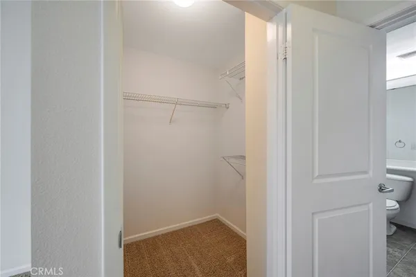 a bathroom with a toilet sink and a shower