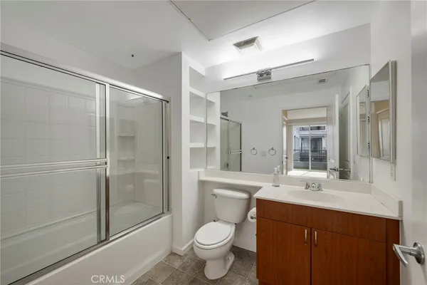 a view of a swimming pool with outdoor seating