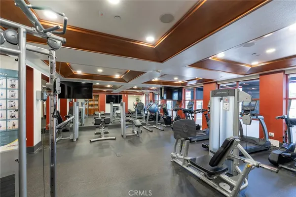a bathroom with a window and a shower