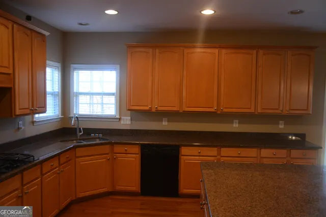 a view of yard covered with snow