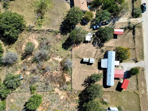 an aerial view of residential house with outdoor space