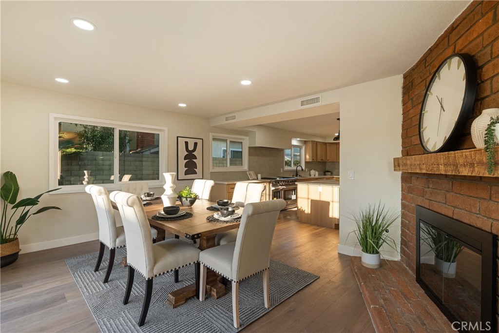 13601 Carroll Way Tustin, CA 92780 - Photo 11 of 28 a dining room with furniture window and wooden floor