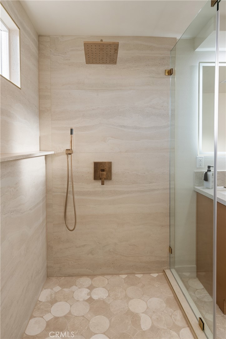 13601 Carroll Way Tustin, CA 92780 - Photo 22 of 28 a bathroom with a shower