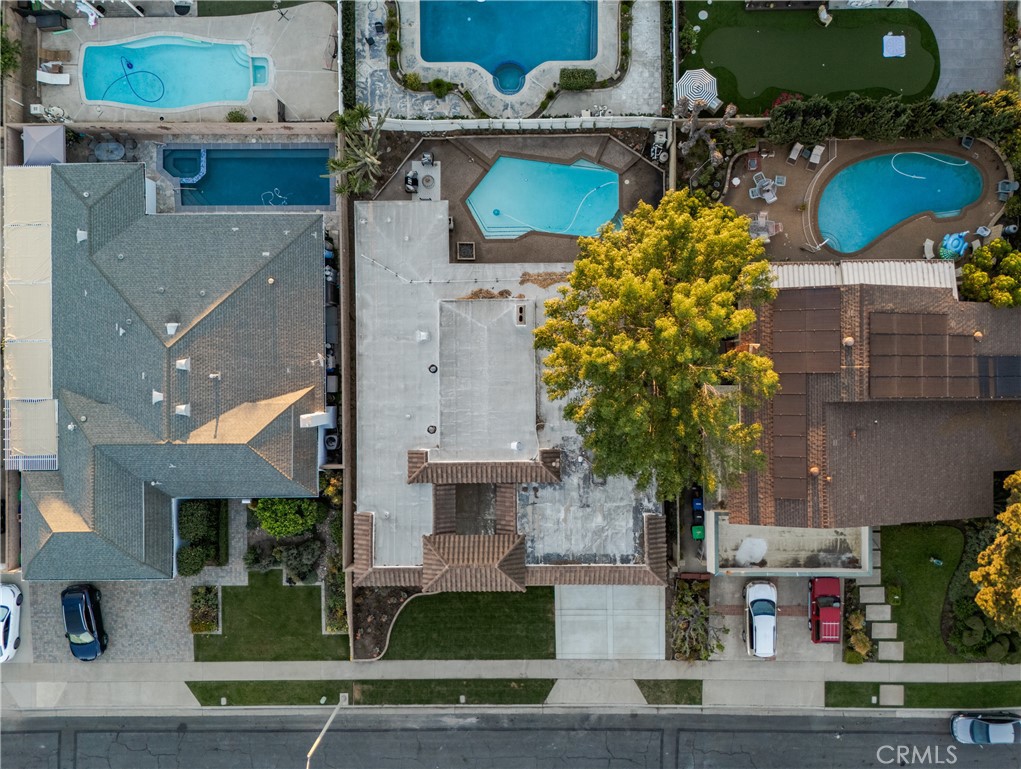 13601 Carroll Way Tustin, CA 92780 - Photo 26 of 28 an aerial view of a house with a swimming pool