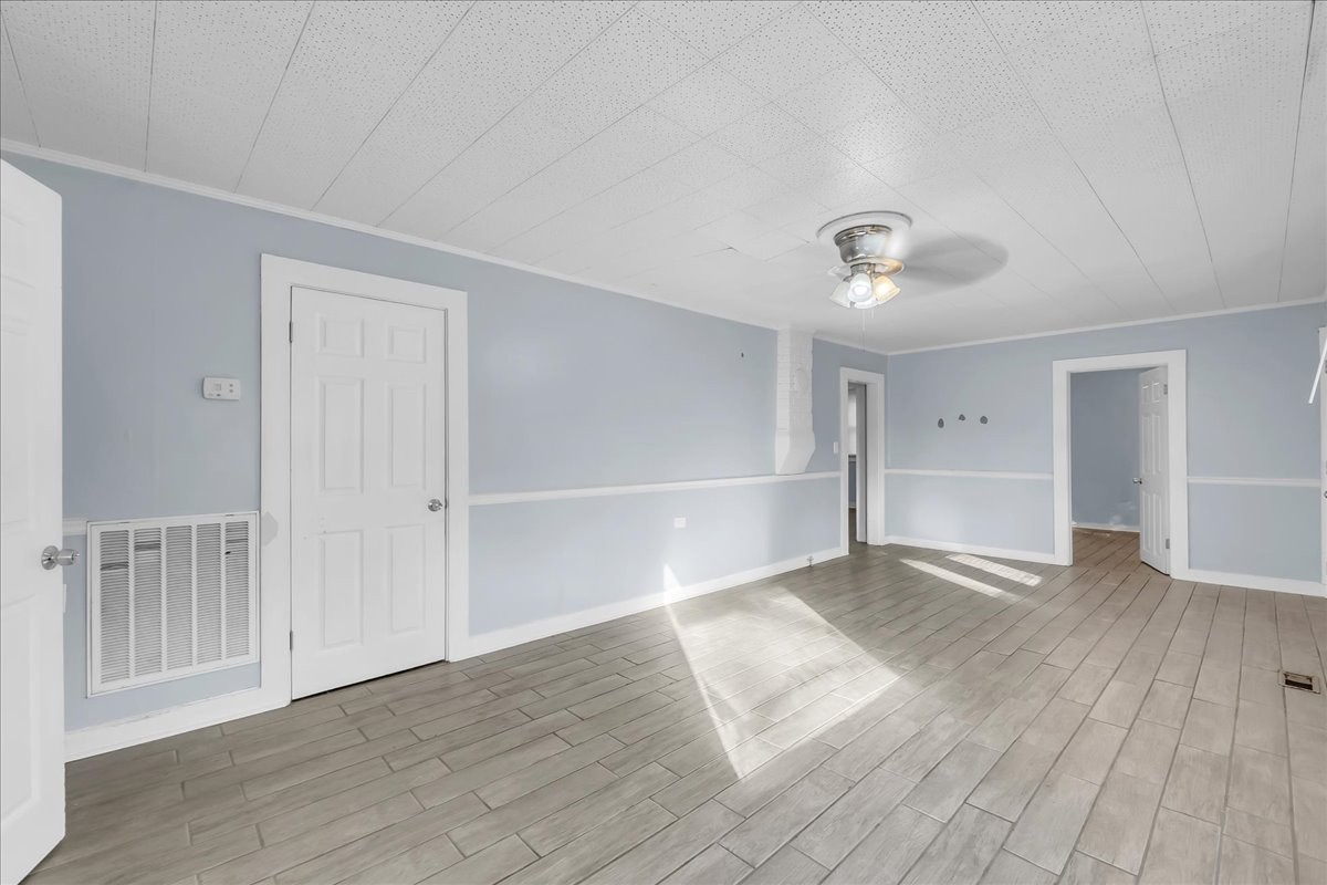 807 Perrigan Lane Manchester, TN 37355 - Photo 12 of 44 a view of an empty room and wooden floor