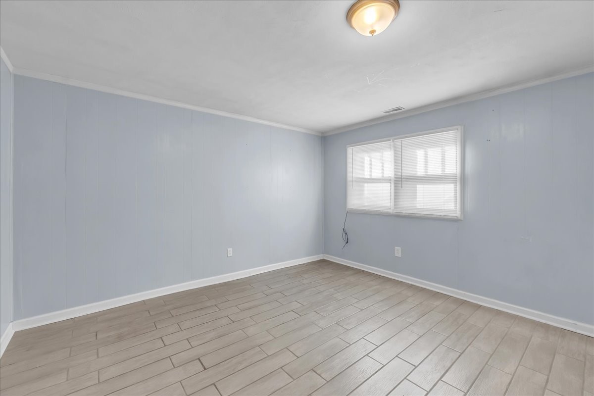 807 Perrigan Lane Manchester, TN 37355 - Photo 14 of 44 a view of an empty room with window and closet area
