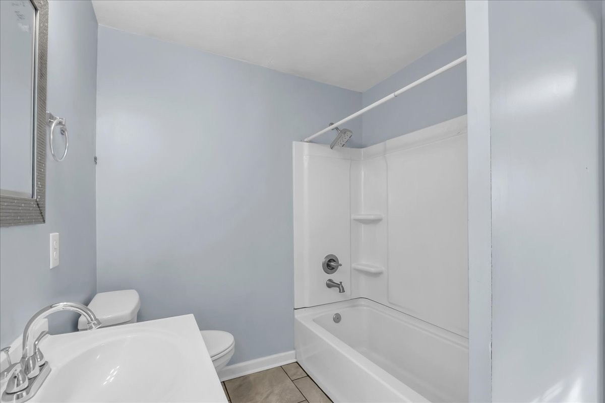 807 Perrigan Lane Manchester, TN 37355 - Photo 17 of 44 a white bath tub sitting next to a white toilet