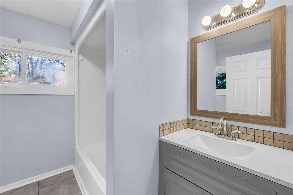 807 Perrigan Lane Manchester, TN 37355 - Photo 21 of 44 a bathroom with a sink and a mirror