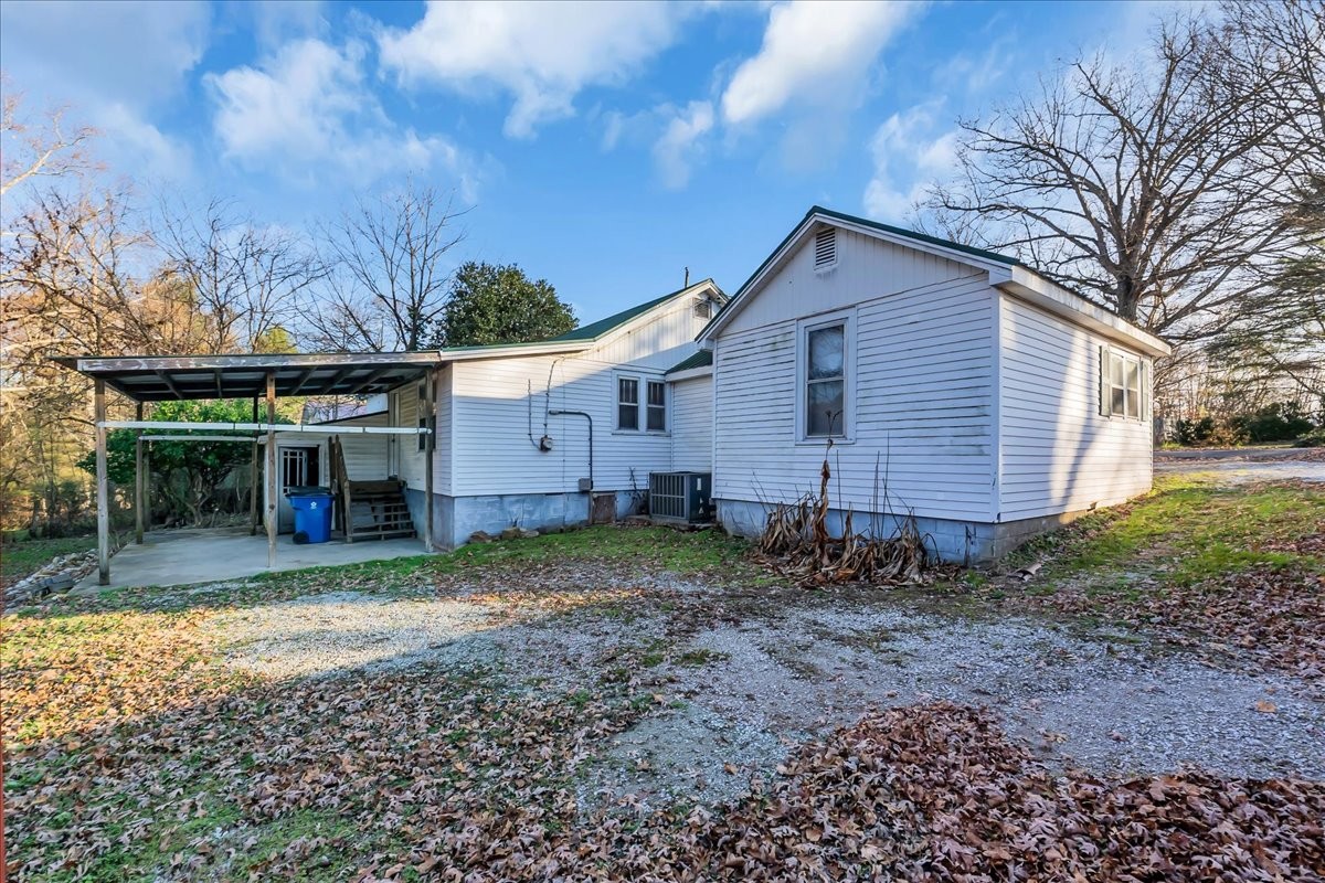 807 Perrigan Lane Manchester, TN 37355 - Photo 35 of 44 a view of a house with a yard and large tree
