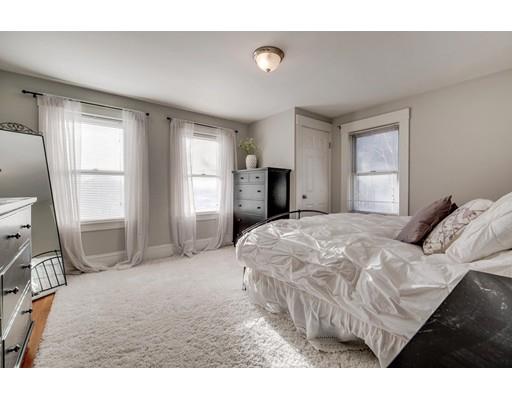 15 Great Road Stow, MA 01775 - Photo 17 of 24 a bedroom with a bed and a tv on the dresser