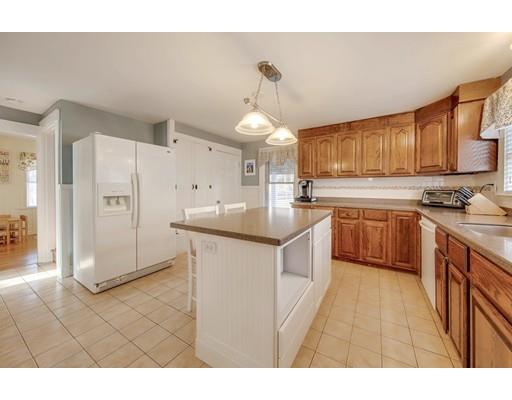 15 Great Road Stow, MA 01775 - Photo 4 of 24 a kitchen with stainless steel appliances granite countertop a stove a sink dishwasher and a refrigerator