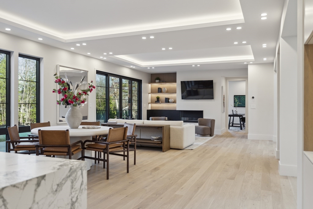 9 Bellevue Road Wellesley, MA 02481 - Photo 12 of 38 a living room with furniture and a large window