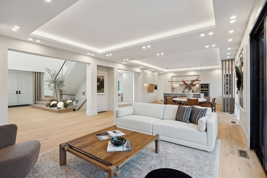 9 Bellevue Road Wellesley, MA 02481 - Photo 14 of 38 a living room with furniture and a table