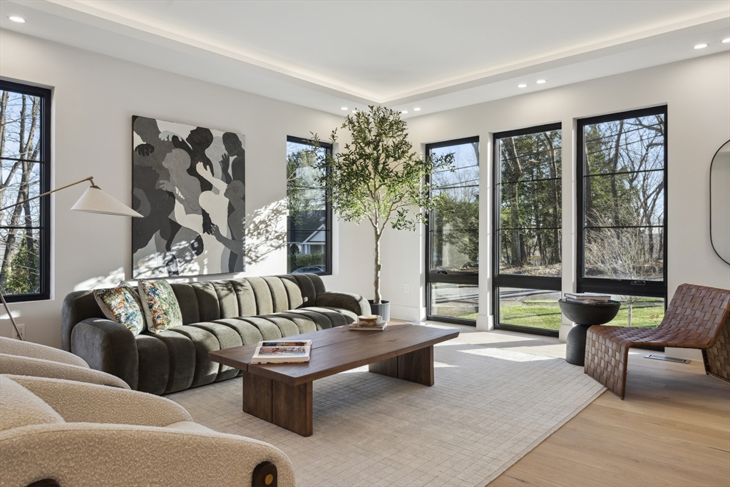 9 Bellevue Road Wellesley, MA 02481 - Photo 19 of 38 a living room with furniture and a large window
