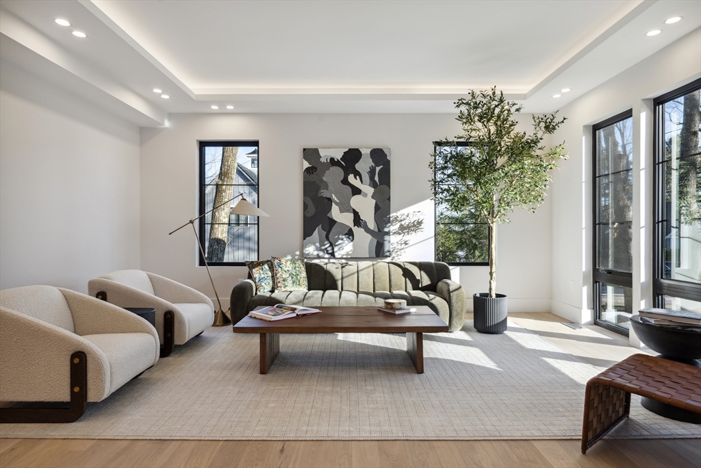 9 Bellevue Road Wellesley, MA 02481 - Photo 20 of 38 a living room with furniture ceiling fan and a window