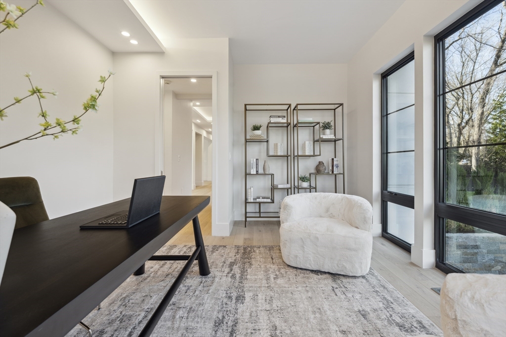 9 Bellevue Road Wellesley, MA 02481 - Photo 21 of 38 a living room with furniture and a window