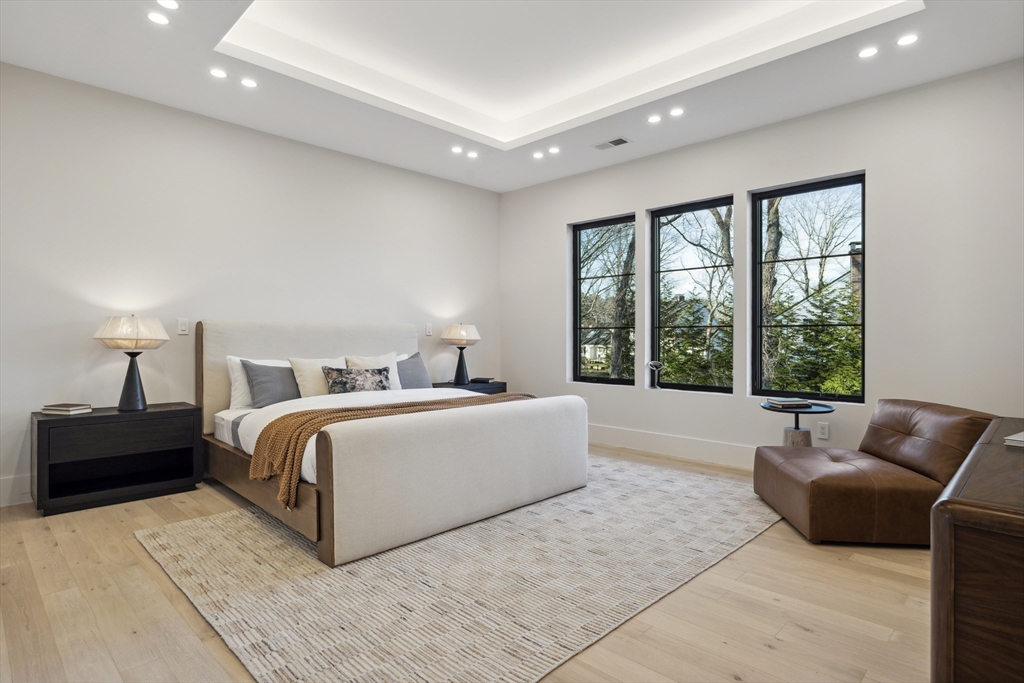 9 Bellevue Road Wellesley, MA 02481 - Photo 24 of 38 a spacious bedroom with a bed and glass window