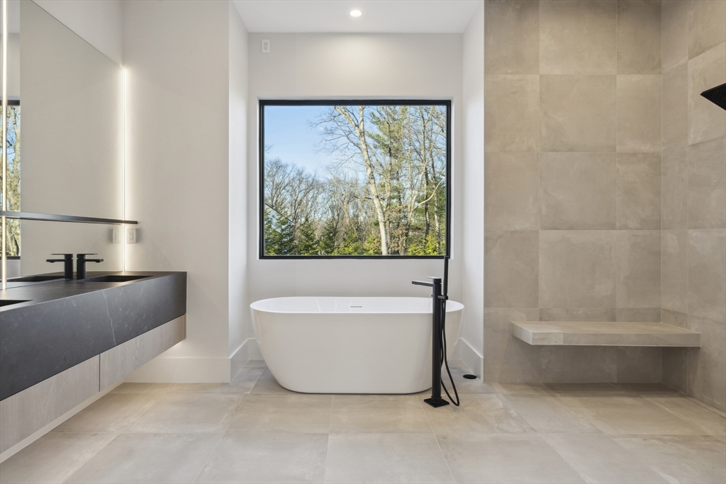 9 Bellevue Road Wellesley, MA 02481 - Photo 25 of 38 a view of a bathtub in a room