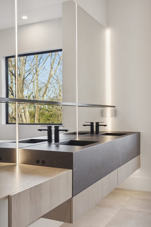 9 Bellevue Road Wellesley, MA 02481 - Photo 26 of 38 a kitchen with kitchen island a large window sink and cabinets