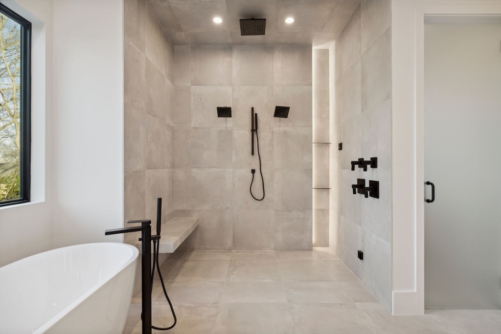 9 Bellevue Road Wellesley, MA 02481 - Photo 27 of 38 a bathroom with a bath tub with a shower