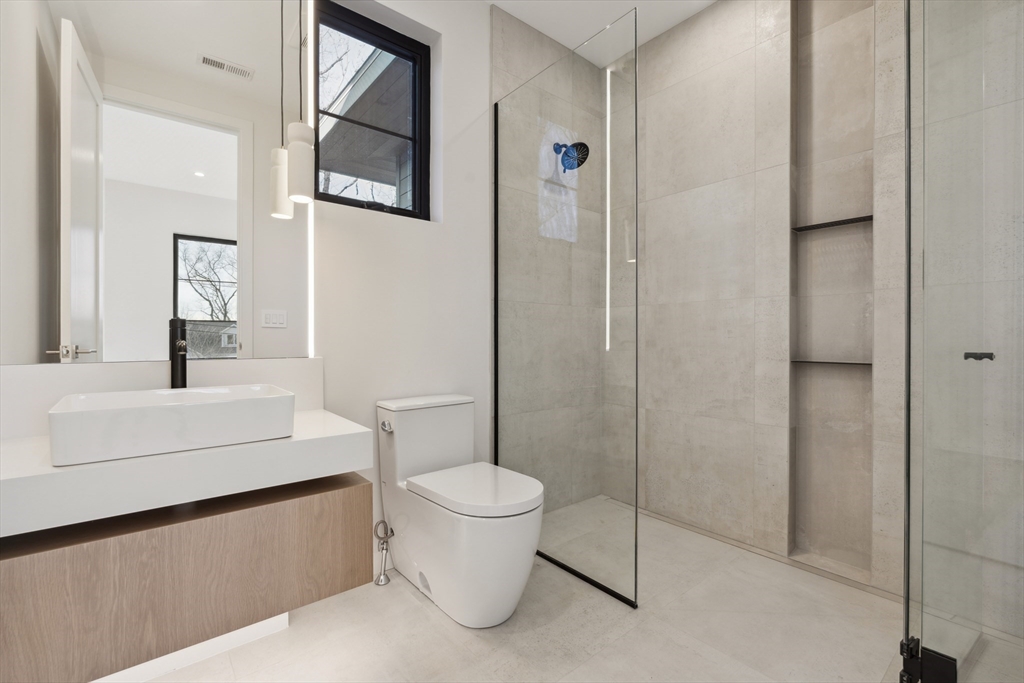 9 Bellevue Road Wellesley, MA 02481 - Photo 30 of 38 a bathroom with a toilet sink and shower